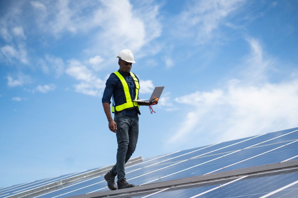 Engineer worker install solar panel. Clean energy concept.